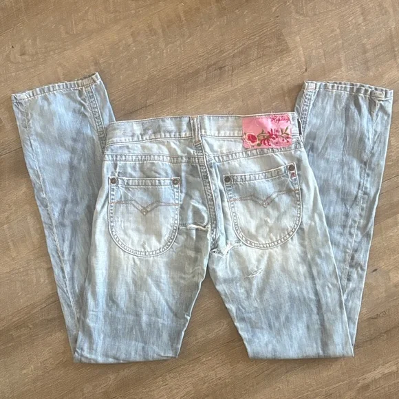 Light Blue Distressed Women's Jeans - Picture 2 of 3